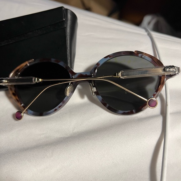 Gold / Lens Color: Blue
Frame Material: Plastic (Acetate)/Metal

Made in Italy - Picture 4 of 7